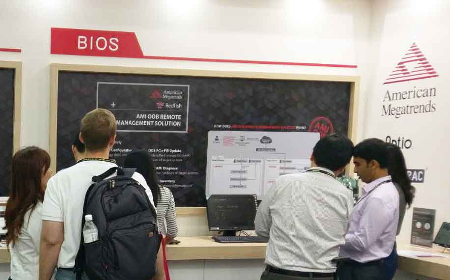 Group of people interacting with AMI booth