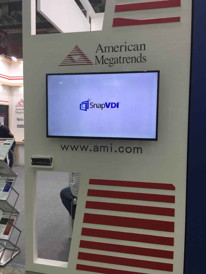 AMI booth wall showing a screen