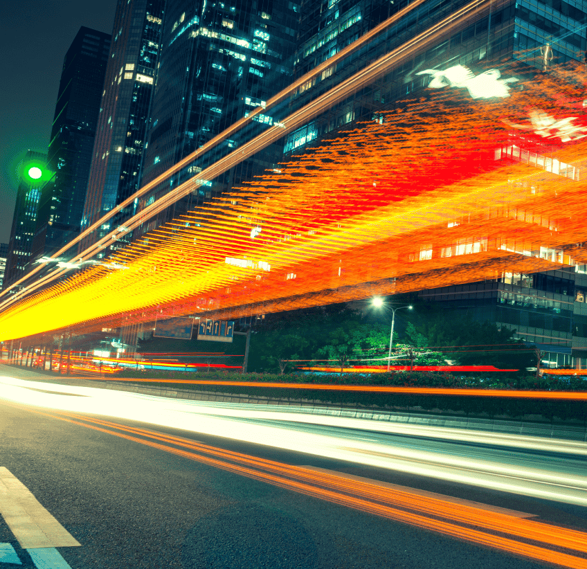 cars moving fast on the highway light painting